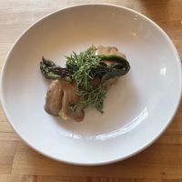 Tamale with sunflower seed mole, topped with asparagus & charred poblano 🫔   at Mandarava in Newburyport