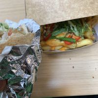 Falafel wrap & T.N.T chips for a fulfilling meal.  at Salt N Fire in Inverness