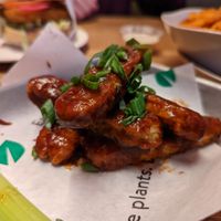 Buffalo wings with BBQ sauce  at Veggie Grill by Next Level in Portland