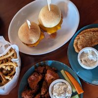 Fries, sliders, empanadas & buffalo cauliflower wings at Despacito in Burlington