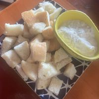 Artichoke dip with bread. Very goodd  at Despacito in Burlington