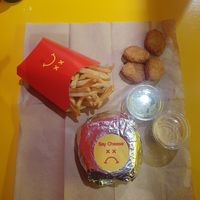 Double cheeseburger meal with green and chuck sauce at Mr.Charlie's - San Francisco in San Francisco