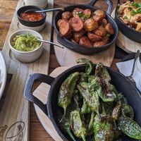 pictured: all vegan tacos, vegan loaded fries, vegan nuggets on the left. at Genussschmied in St Wolfgang Im Salzkammergut
