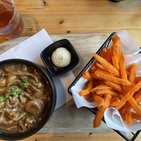 vegan ‘zuurvlees’ (sour meat) with sweet potato fries  at Breakaway in Sint Geertruid