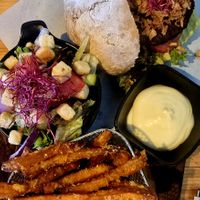 Classic burger, sweet potatoe fries and salad at Breakaway in Sint Geertruid