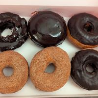 Cinnamon and sugar and chocolate glazed sharing a box with my partner's two non vegan donuts at Stan's Donuts & Coffee in Oakbrook Terrace