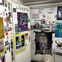 WC filled with fun stickers and messages    at Cafe Erde in Graz