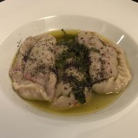 Beet filled dumpling in vegan butter sauce. at Cafe Erde in Graz