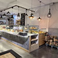 The counter with English and Spanish language menu  at Moringa in Barcelona