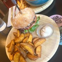 Vegan Queer burger, Huera meatballs in background  at La Oveja Negra in Madrid