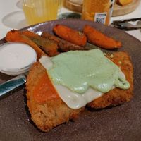 Soy milanesa with sweet potato fries at La Oveja Negra in Madrid