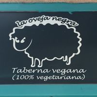 Sign at La Oveja Negra in Madrid