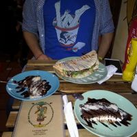 Cake and a main dish at La Oveja Negra in Madrid