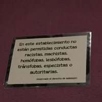 A sign above the door at La Oveja Negra in Madrid