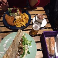 Soy schnitzel and tortilla with champions and vegetables. Bread as an appetizer. Also very nice coffee with whipped cream and chocolate. at La Oveja Negra in Madrid