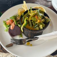 Curry in a coconut  at Hideaway Beach Bar in Mele Maat