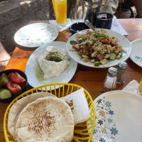 Pita bread, fattoush salad, and labneh at Fattoush in Haifa