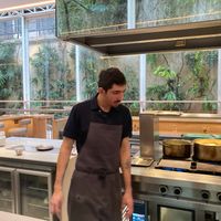 The seats surround the "kitchen," so you can see as they make the food. at MARTi in San Miguel De Tucuman