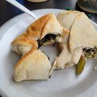 Spinach pie and falafel sandwich at Sanabel Middle East Bakery in Akron