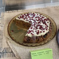 Vegan carrot cake with raw cashew coconut creme and pomegranate seeds  at Manjari in Burgas
