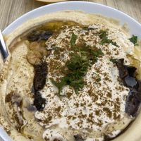 Hummus with mushrooms and chickpeas   at Tanami Hummus Bar in Raanana