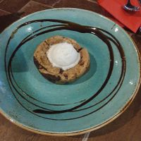 CHOCOLATE CHIP LAVA COOKIE Served with vegan vanilla ice cream at TGI Fridays in Bolton