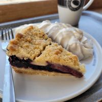Blueberry pie with whipped soy cream at Espresso House in Uppsala