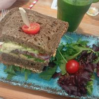 Green smoothie and vegan sandwich (perfectly well seasoned imo) at La Mala Brunch - Setas in Sevilla