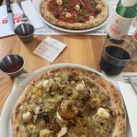 Artichoke Pizza (bottom) sooooo good!!  at Pit'sa in Bergamo