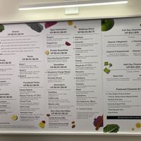 Wall menu at Pressed - Moynihan Train Hall in New York City