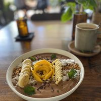 Choco smoothie bowl with fresh fruit  at RiZE in Canggu