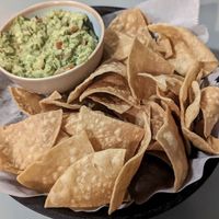 Fire roasted salsa, guacamole and chips. Also had their veggie burrito w/o cheese or sour cream. Also rice and refried beans are supposedly vegan but I did not have    at The Mexican at Central Gastropub in Central