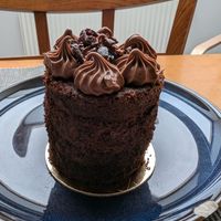 Chocolate and cherry cake. Delicious rich cake with an excellent cream and plenty of cherry jam inside. at Krafin in Prague