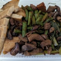 my takeaway meal (I thought the slab was eggplant, but it was mock meat) at Youta Vegan Foods in Bangkok