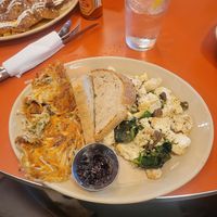 Tofu scramble (mushrooms, spinach, jalapenos) with sourdough, jam, and hashbrowns #Veganuary at Snooze - Monroe Dr in Atlanta