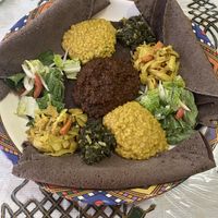 Vegan platter with gluten-free injera  at Enat in London