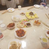 Left to right: vegan ham with sweet sauce, dumpling, buns with side filling, and "chicken" wings at Water Lotus 清水荷花食坊 - 武侯祠 in Chengdu