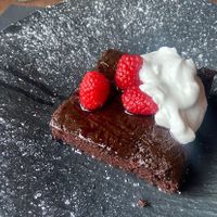 Vegan Red wine chocolate cake with drunken raspberries. Amazing!   at Bellona in Toronto