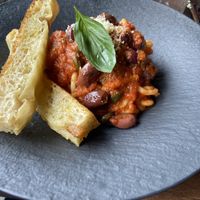 Yummy pasta dish with olives and capers   at Bellona in Toronto