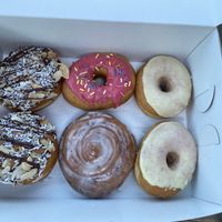 Almond Joy, Cinnamon Roll, Lemon Lavender, and Raspberry Sprinkle  at Revolution Doughnuts in Decatur