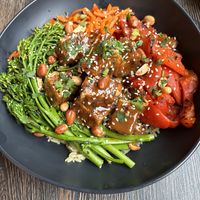 Black Garlic Peanut Tofu Bowl   at Pig Minds Brewing in Machesney Park