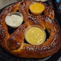 Pretzel with mustard, ranch, and cheese sauce at Pig Minds Brewing in Machesney Park