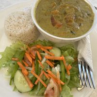 Veggie coconut curry with white rice and green salad with no dressing    at Chef Juan's Kitchen and Pastries in Caye Caulker