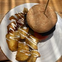 Portobello balsamic burger with potatoes   at Peekaboo Backyard Eatery in Kaitaia