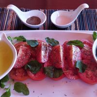 Tomato salad with olive oil and balsamic vinegar at SpringRiver Resort & Restaurant in Ban Tiou Village
