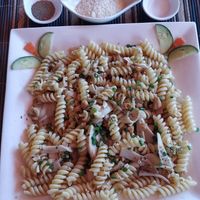 Pasta with local mushrooms and parmesan (came on the side) at SpringRiver Resort & Restaurant in Ban Tiou Village