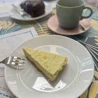Lemon and ginger raw slice, with chococake in the background! 💚  at Bij Fleur in Torrox Costa