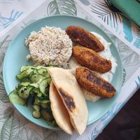 Lentil sausages with seasoned rice at Bij Fleur in Torrox Costa