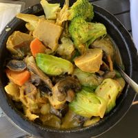 Delicious curry vegetable bowl with vegan chicken   at The Purple Elephant in Northport