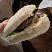 Panino Germi di soia (grilled veggie, hummus, dried tomatoes )  at Orzo Bruno in Pisa